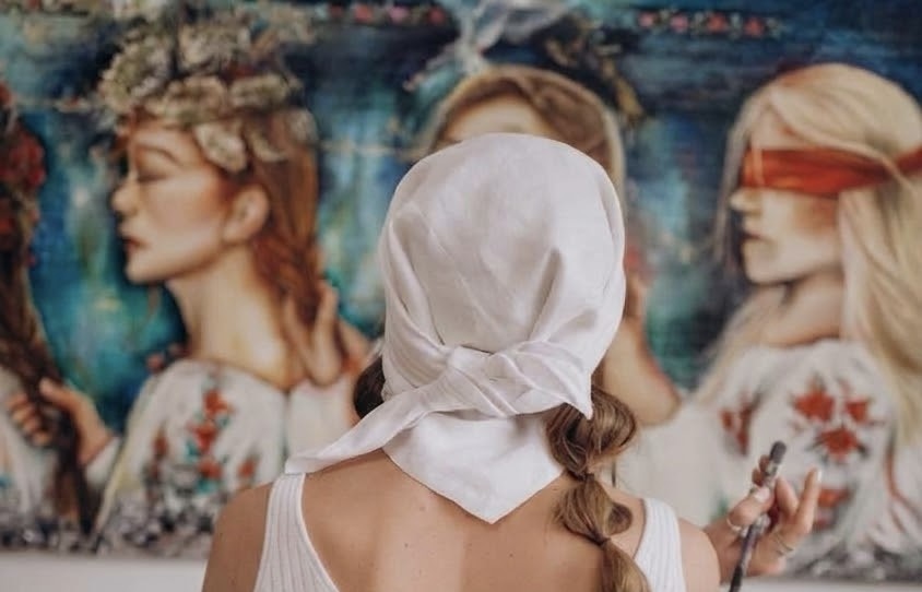 Liudmyla at work on a figurative painting